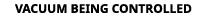 VACUUM BEING CONTROLLED